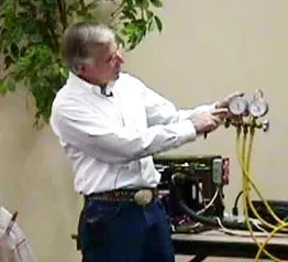 A man demonstrating how to use gauges.